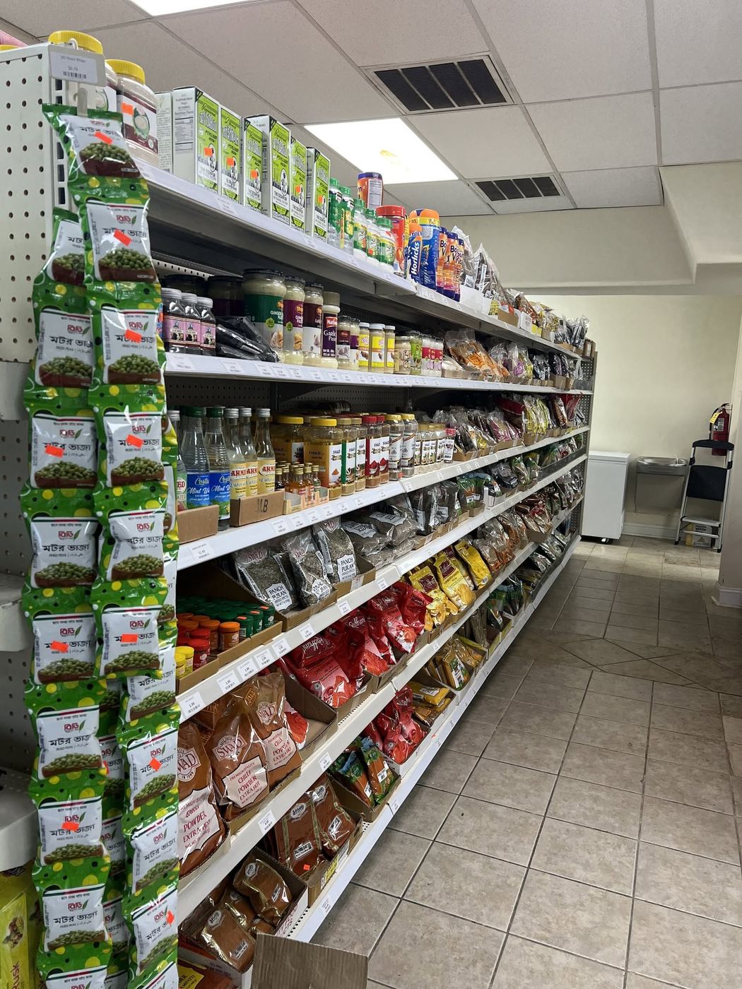 Spice aisle at Taqwa with masalas, pickles and Bangladeshi snacks